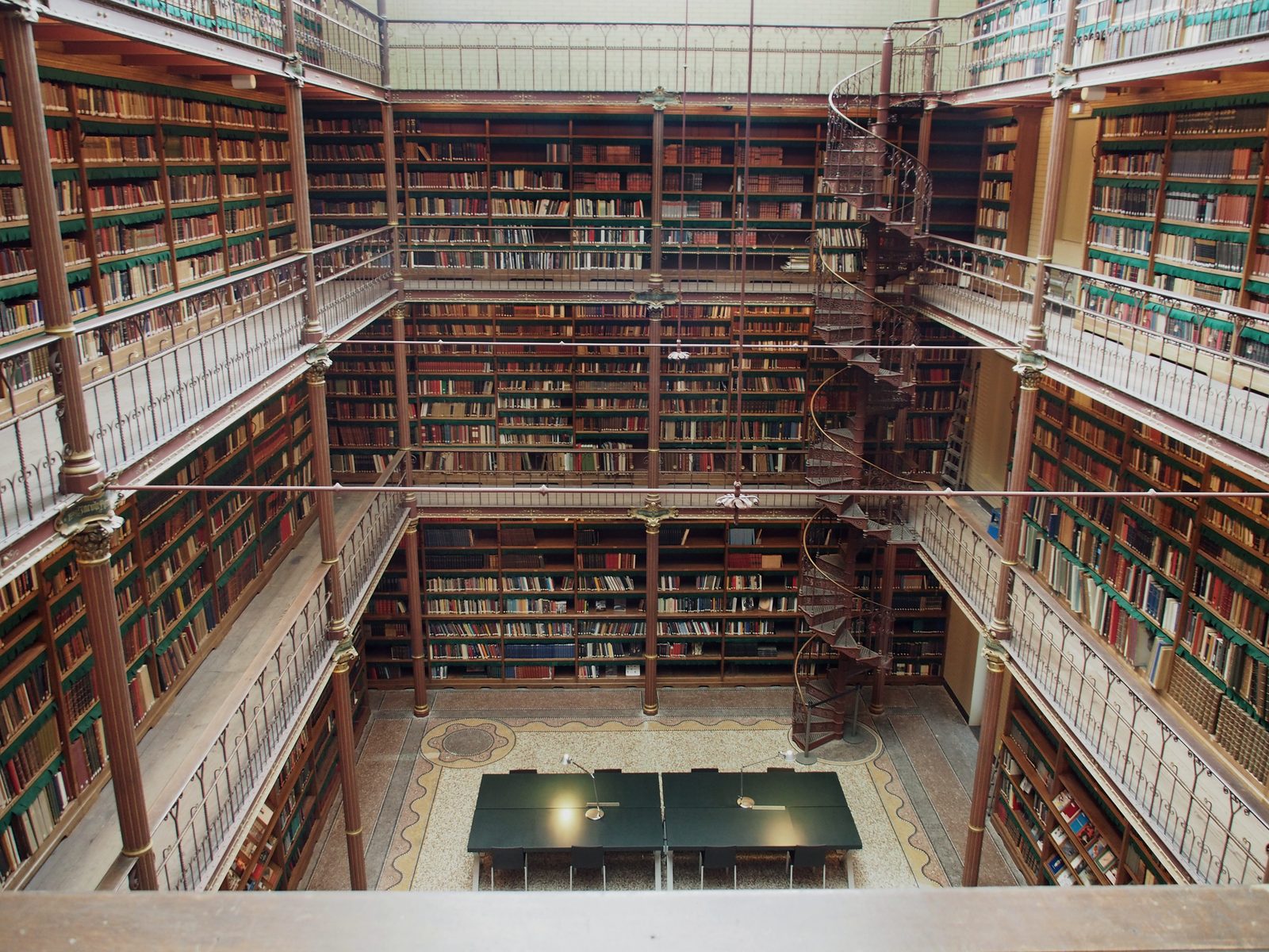 The research library at the Rijksmuseum: a galleried reading room lined with reference volumes.